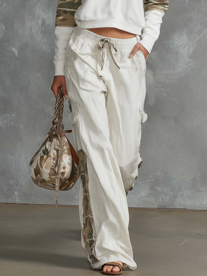 VANIA - Completo sporty bianco con felpa half-zip e cargo ampi