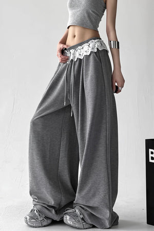 QUARANTI - Pantaloni wide leg con dettagli in pizzo