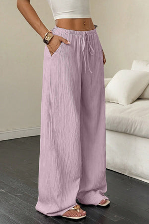 ANTONIA - Pantaloni palazzo con nodo in vita