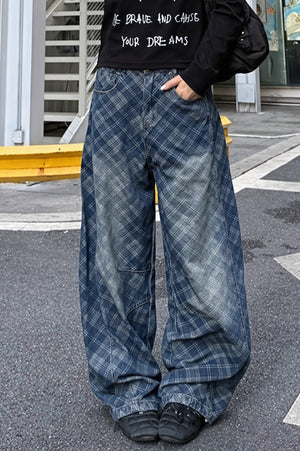 VERONICA - Jeans blu a gamba curva con stampa a quadri