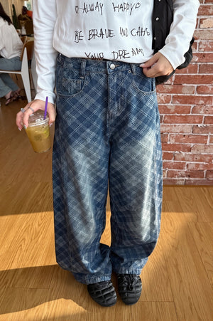 VERONICA - Jeans blu a gamba curva con stampa a quadri