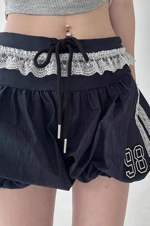 ROSA - Shorts blu a vita alta con pizzo e coulisse