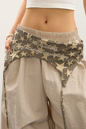 GUAGNANO - Pantaloni cargo curvy con stampa stellare