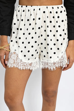 FURORE - Shorts a pois con dettagli in pizzo