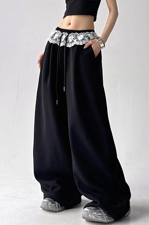 QUARANTI - Pantaloni wide leg con dettagli in pizzo