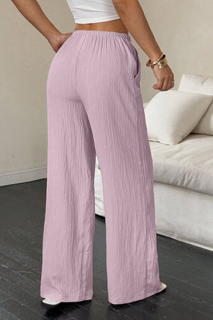 ANTONIA - Pantaloni palazzo con nodo in vita
