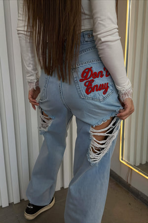 MACERATA - Jeans in denim a gamba larga con ricami