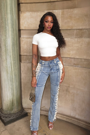 ORTELLE - Jeans bootcut a vita alta con lacci