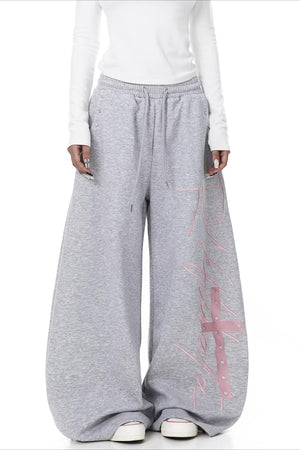 GIAGLIONE - Pantaloni wide leg curvi con stampa a contrasto